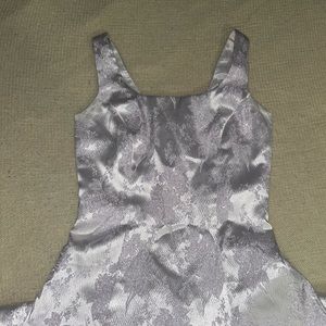 White floor length Dave & Johnny dress with purple embroidered accents